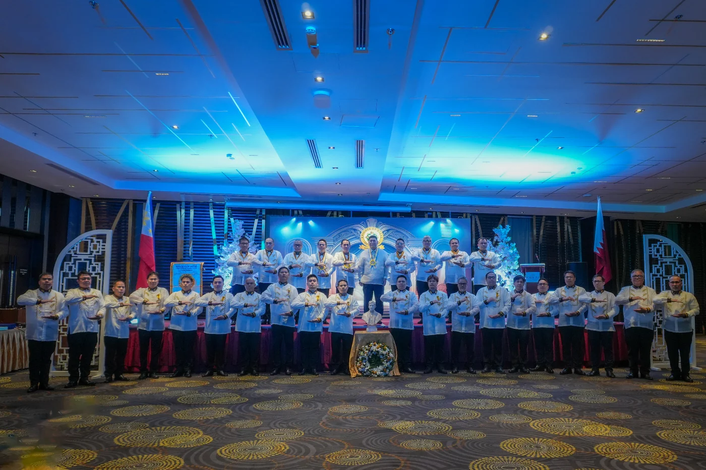 Knights of Rizal Doha Chapter ceremonial formation on stage